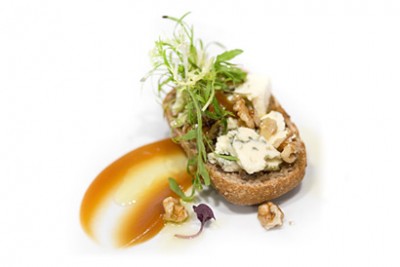 Walnut minicapriccio with blue cheese, cider-spiked apple compote and fresh herbs